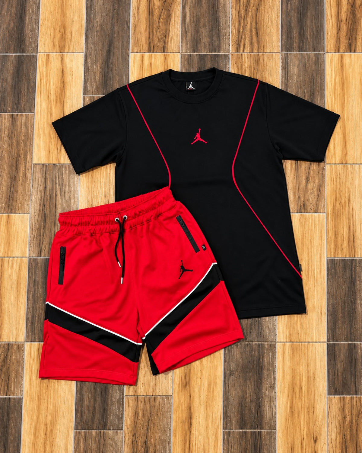Conjunto Jordan camiseta negra y pantaloneta roja con detalles negros